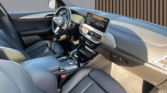 Intérieur BMW X3 xDrive30e – tableau de bord et sièges avant d’un SUV hybride à Perpignan / voiture occasion Perpignan